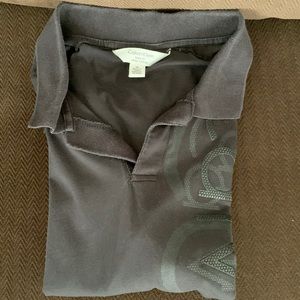 Calvin Klein - black polo - previously worn - light use